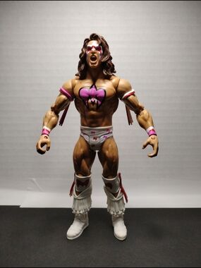 WWE Ultimate Warrior Action Figure - Pink & White Ring Gear